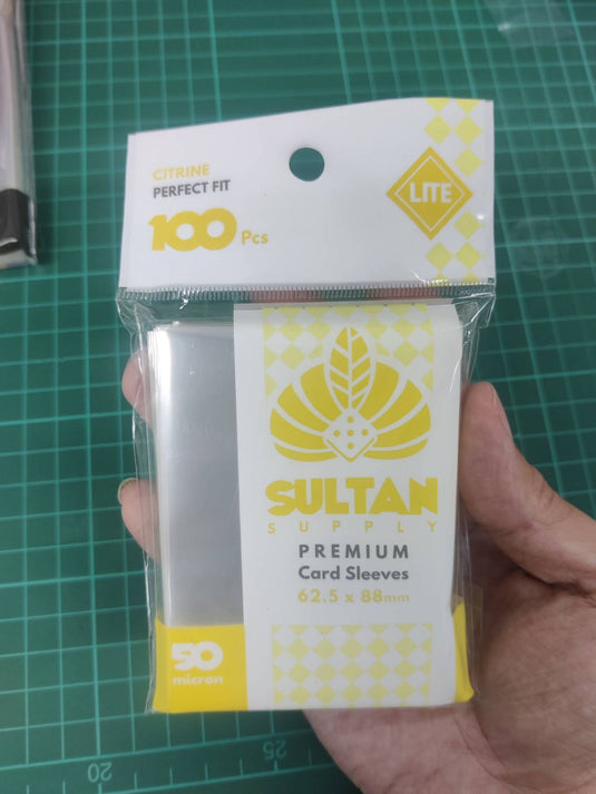 Sultan Supply: 100pcs 62.5 x 88 mm (64.5x90) (Citrine Lite) 50 micron Sleeves